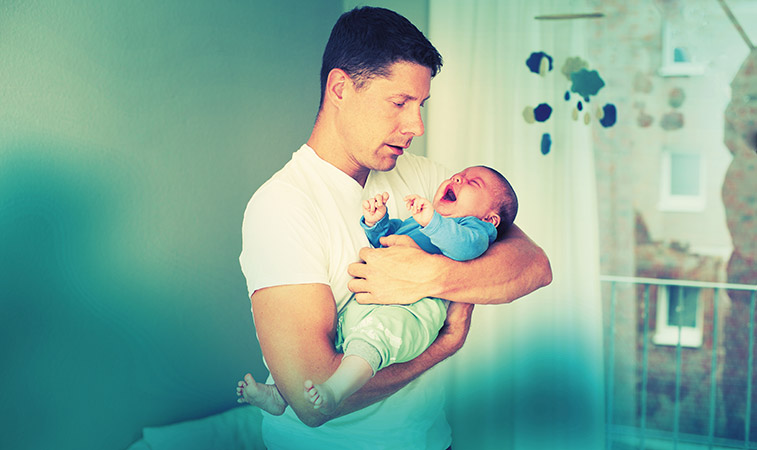 Vater mit Baby